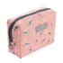 The Daily Drop portable travel cosmetic bag in pink with bird patterns, perfect for cosmetic storage on the go.
